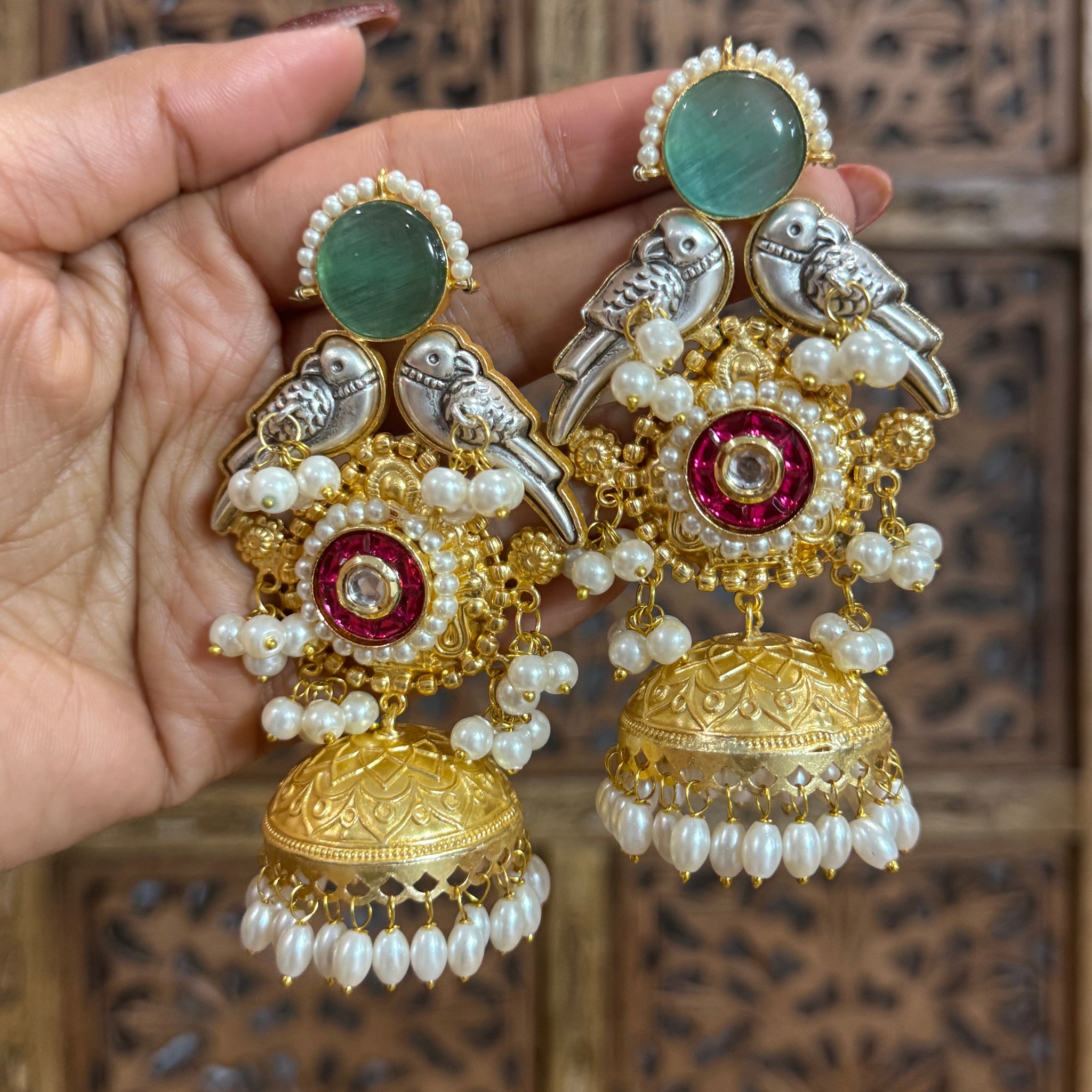 Vaanya Dual Tone Parrot Brass Jhumka Earrings