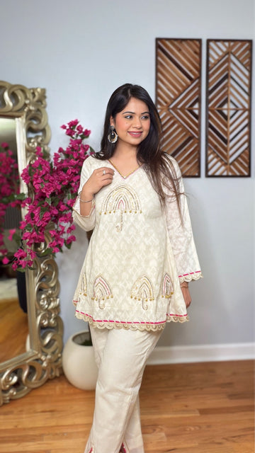 Neyara – Cream Embroidered Short Peplum Cord Set